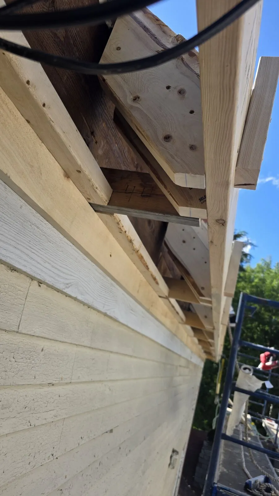 Roof replacement and skylight removal — work in progress (20)