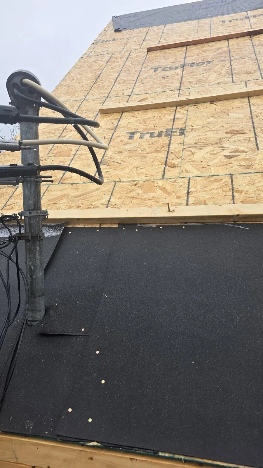 Roof replacement and skylight removal — work in progress (22)
