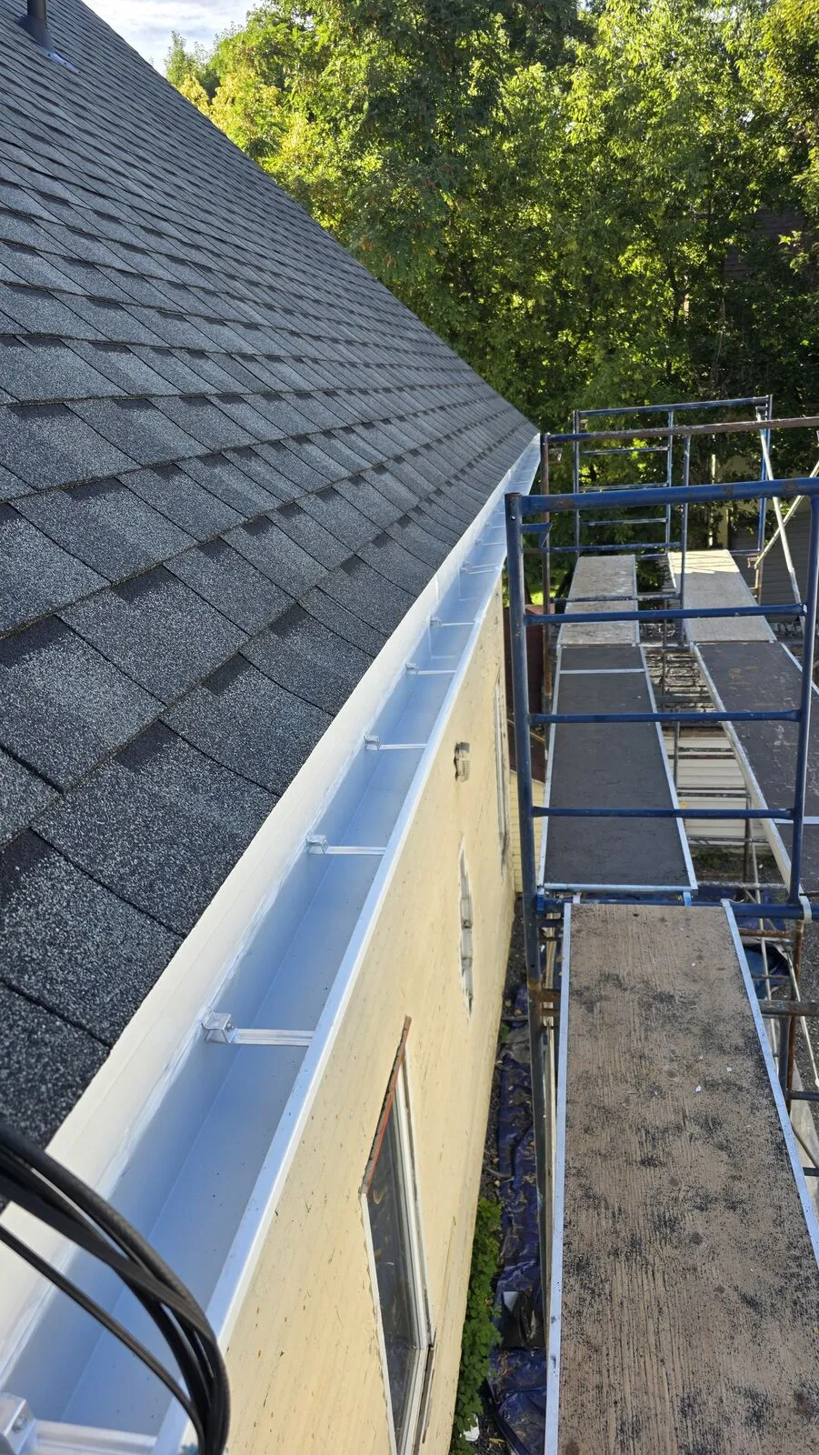 Roof replacement and skylight removal — work in progress (25)